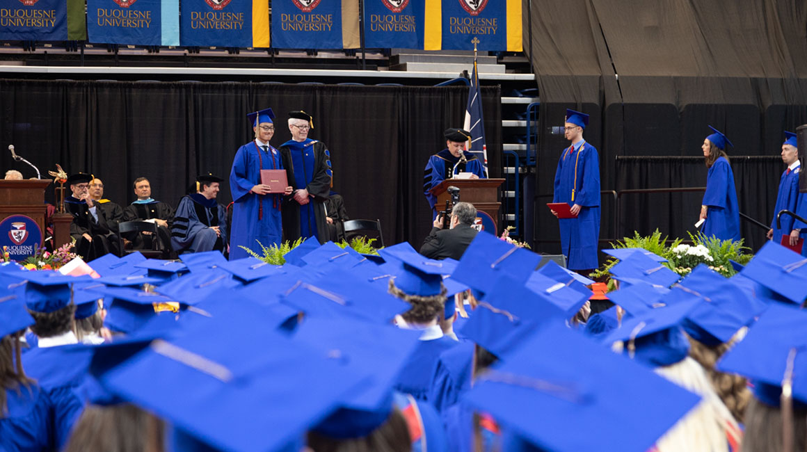 Students graduate during the spring 2022 commencement ceremony. 