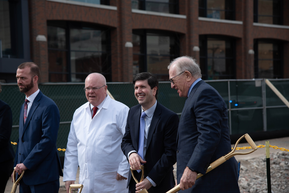 Four men at university groundbreaking