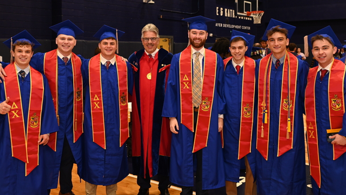 President Ken Gormley with members of the Delta Chi fraternity.