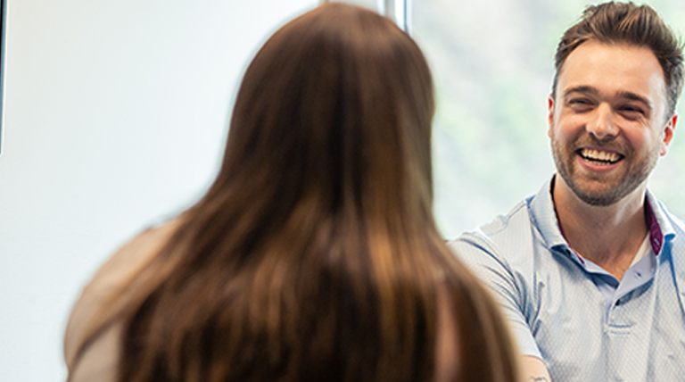 Ally Representative meeting with student.