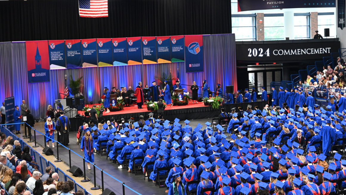 Aerial view of the School of Business graduating class of 2024 at the Cooper Field House. 