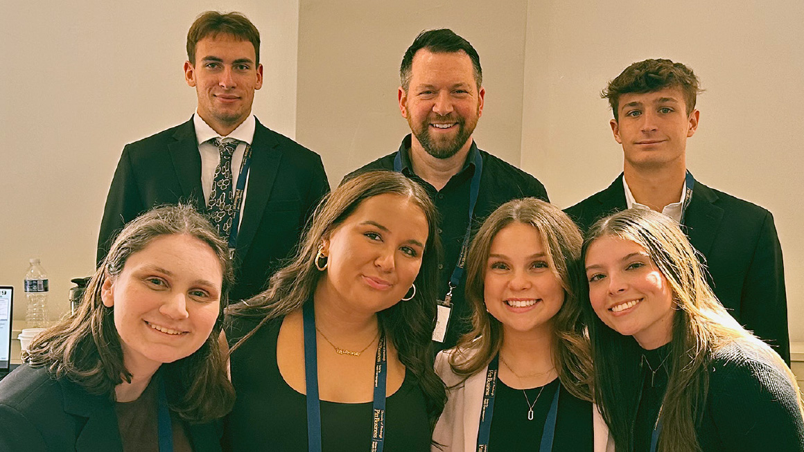 Image Left to Right: Maria Walletz, Brianna Pierce, Jackie, Burich, Emma Pfeiffer (Front Row), Jeremy Rawicz, Dr. Ryan Atkins, Jack Forsythe (Back Row)