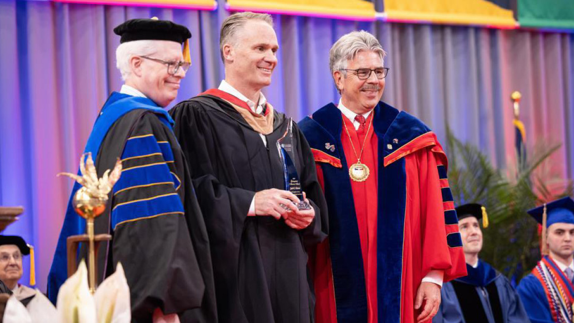 Pictured left to right: Dr. Dean McFarlin, Jack Glover, and President Gormley.