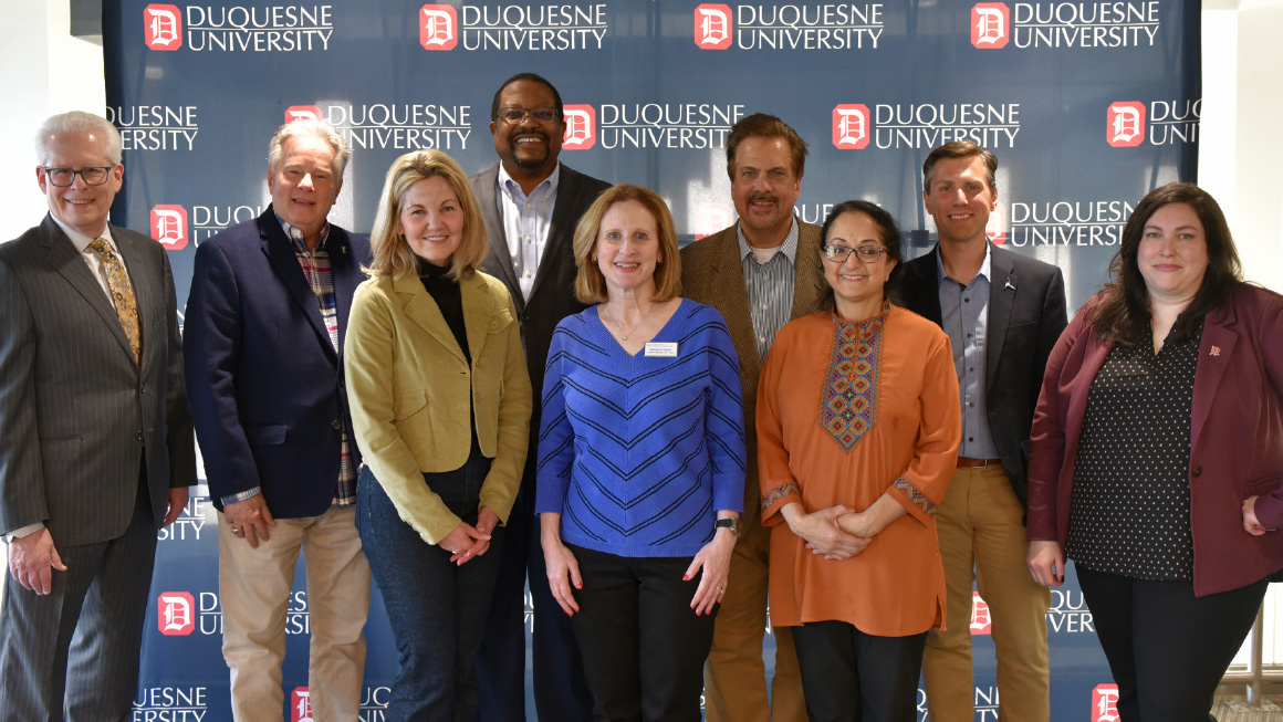 Left to Right: Duquesne’s Dr. Dean McFarlin, DNVC Judges Rich Longo, Allison Howard, Bill Generett, Melanie Simko, Pete Ferraro, Afshan Khan, Tom Lauwers, and DNVC Director Staci Offutt