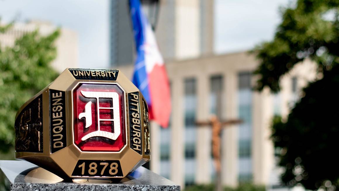 Duquesne University Class Ring with Rockwell Hall in Background