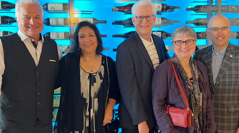 Rico Francani, Dee Francani, Dean McFarlin, Laurie McFarlin, and Jim Miller at Oceans 234, a restaurant in Deerfield Beach, Florida