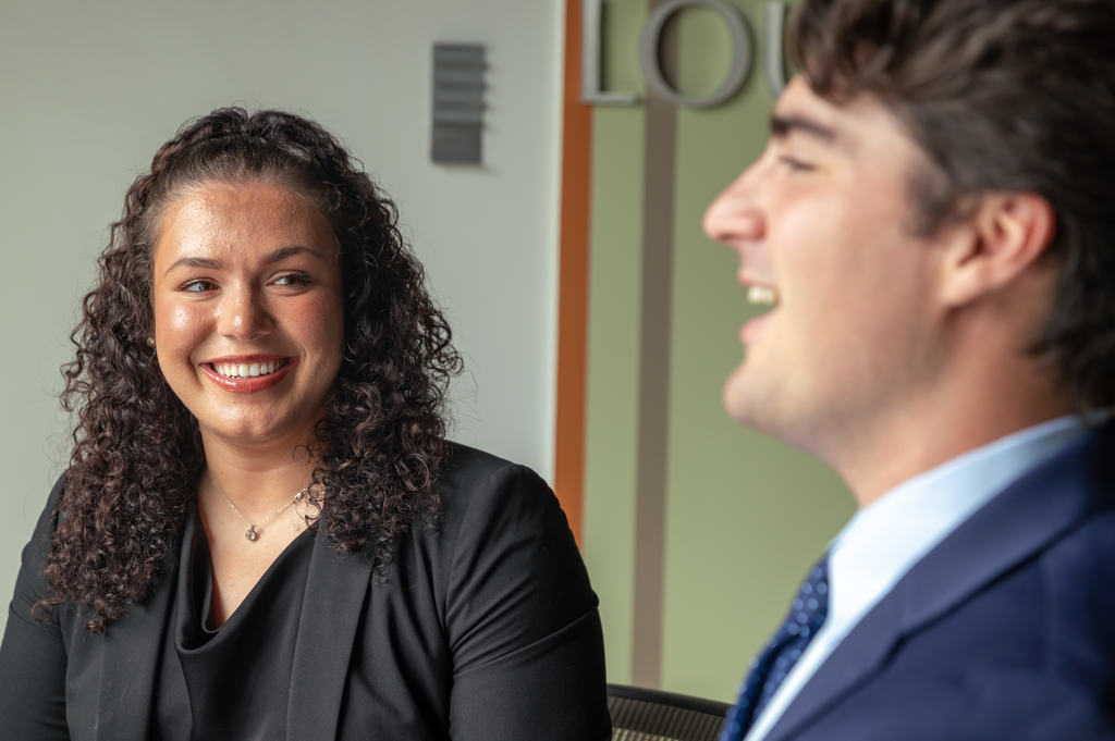 Business law students smile.
