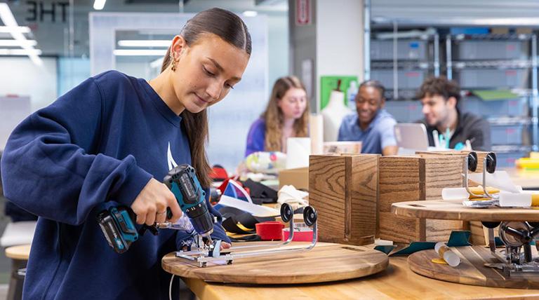 Entrepreneurship student in the maker space.