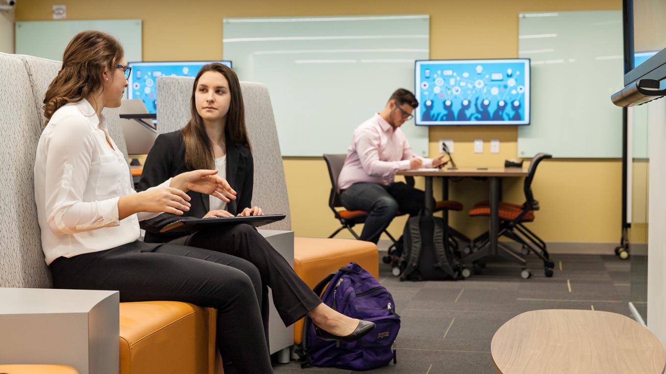 Students talk in the Ideation Suite. 