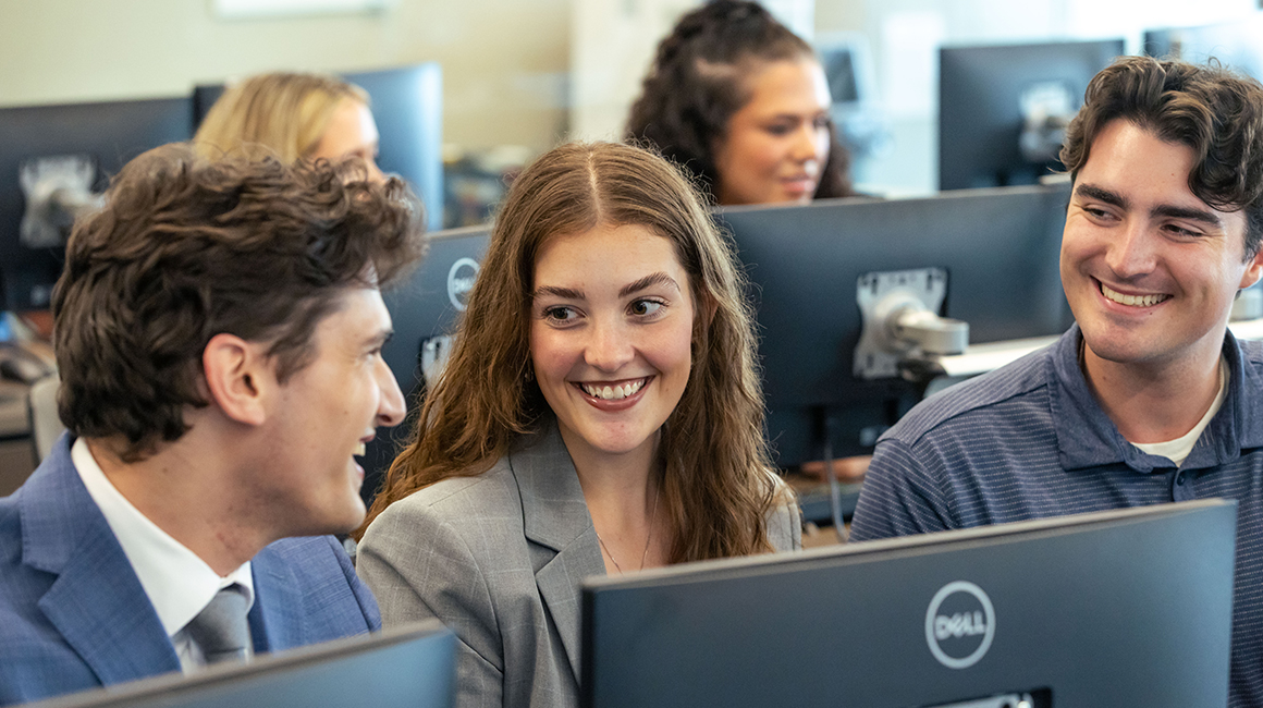 Students working together in a computer lab.