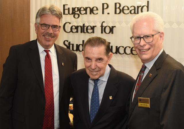 Eugene Beard poses with Duquesne University President, Ken Gormley and Dean McFarlin, Dean of the Palumbo-Donahue School of Business.