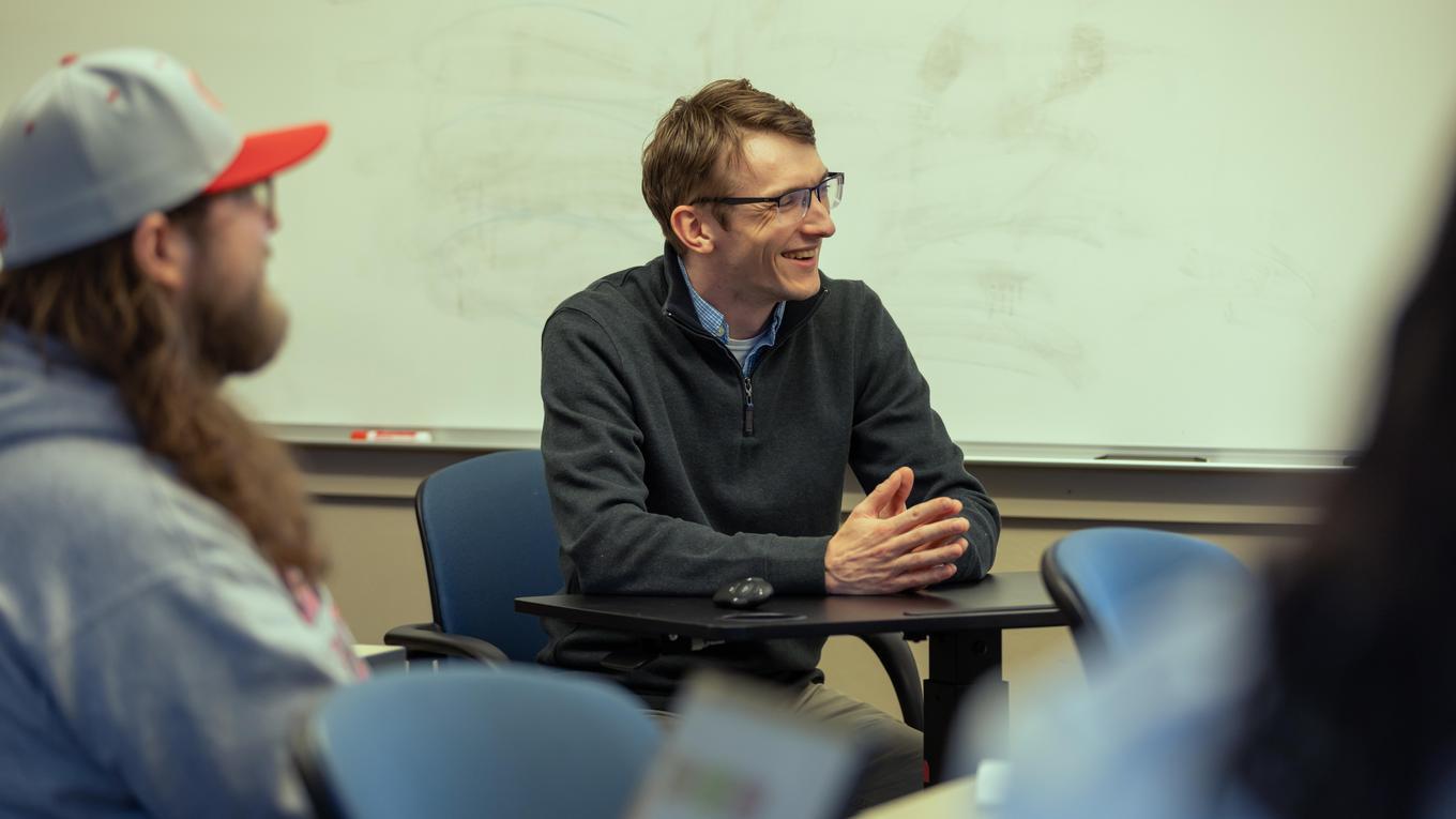 M.S. Clinical Mental Health Counseling professor in discussion with graduate students in Pittsburgh classroom in CACREP-accredited master's program.