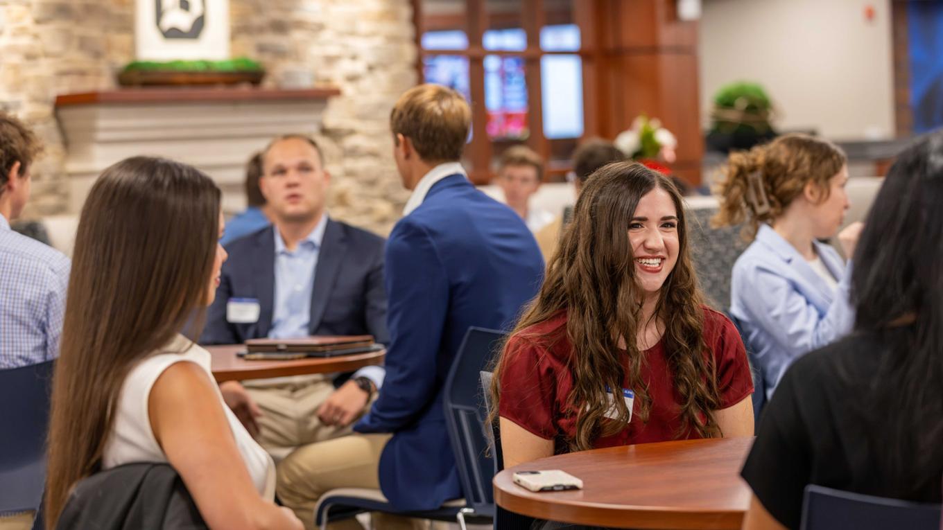 Students smiling and talking 