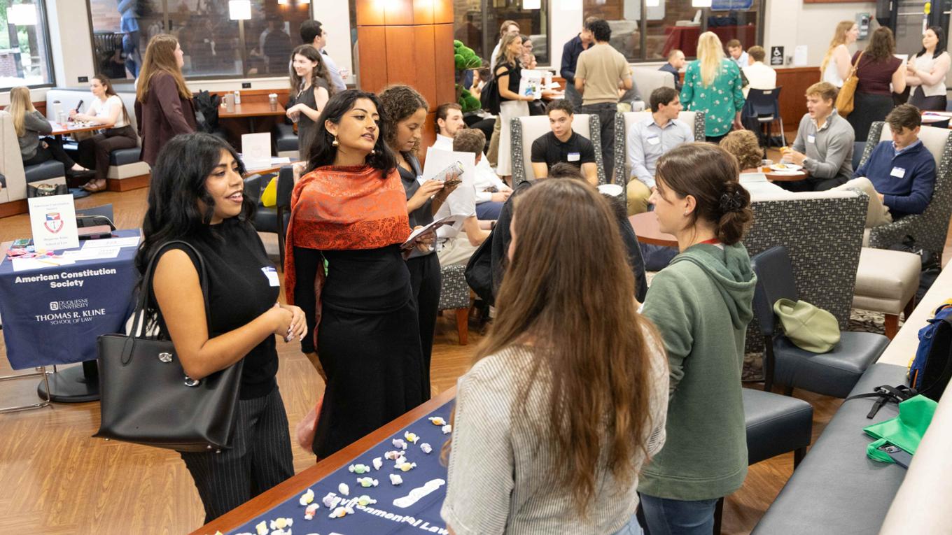 Students standing and talking