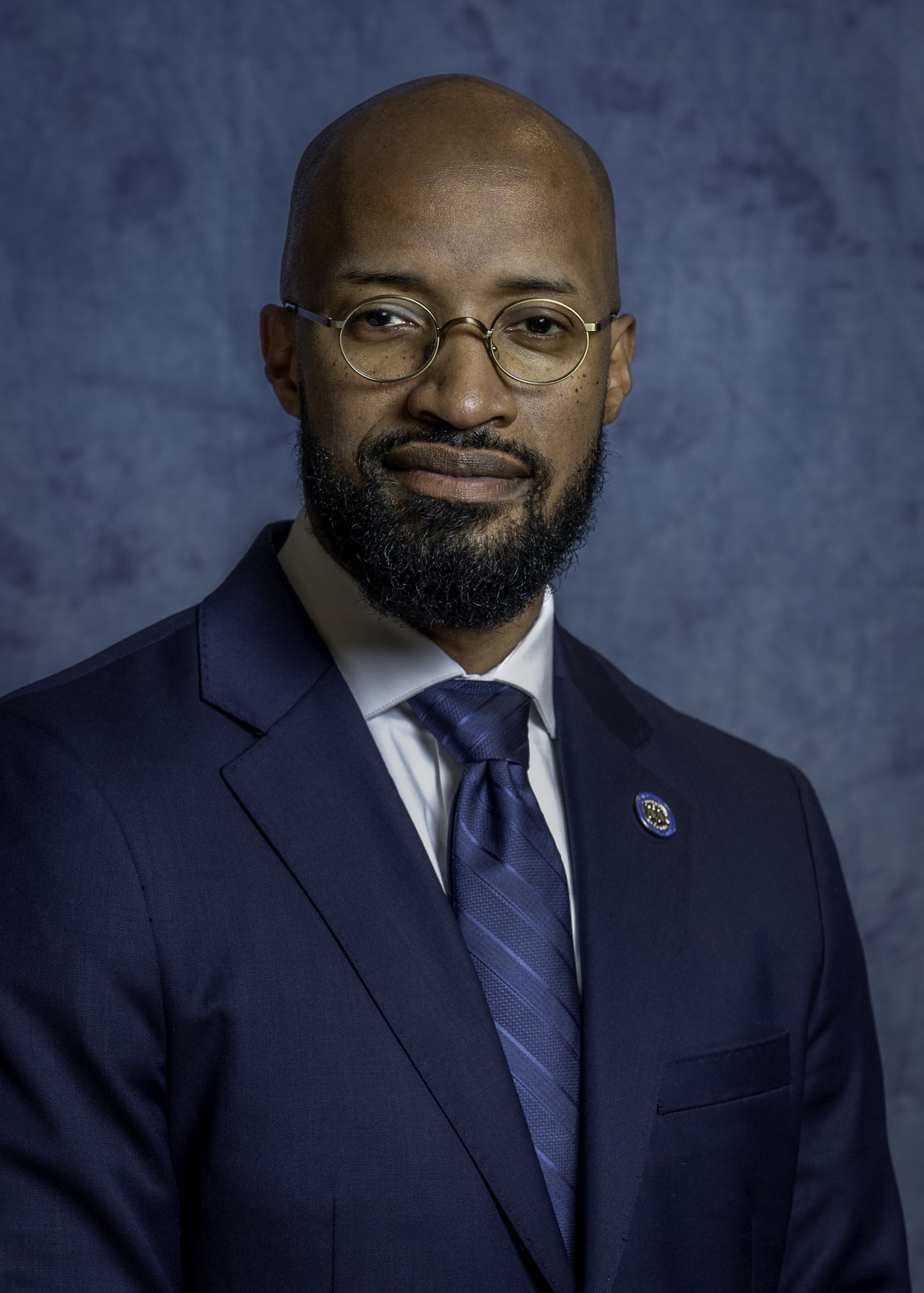 Jehosha Wright in blue suit with blue tie