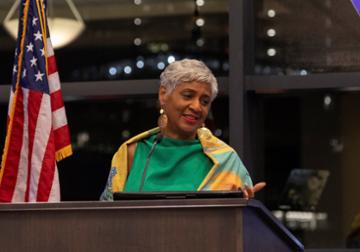 Judge Kim Berkeley Clark speaking at a podium