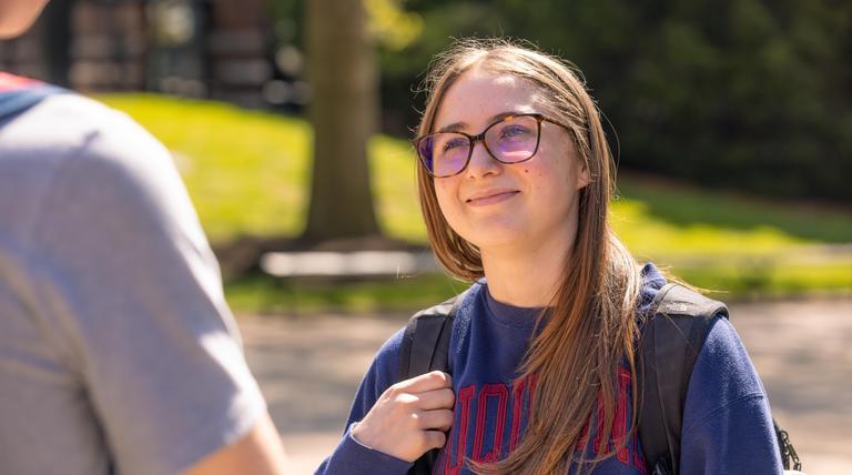 Viv Kuliecza in a Duquesne University sweatshirt.