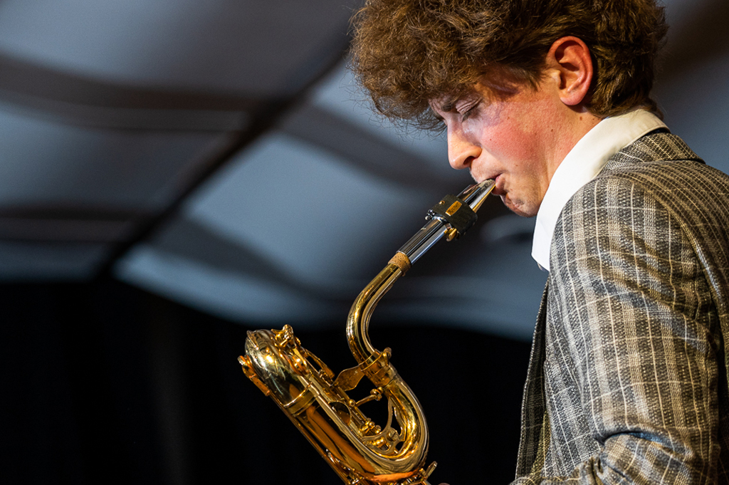 A student plays the saxophone.