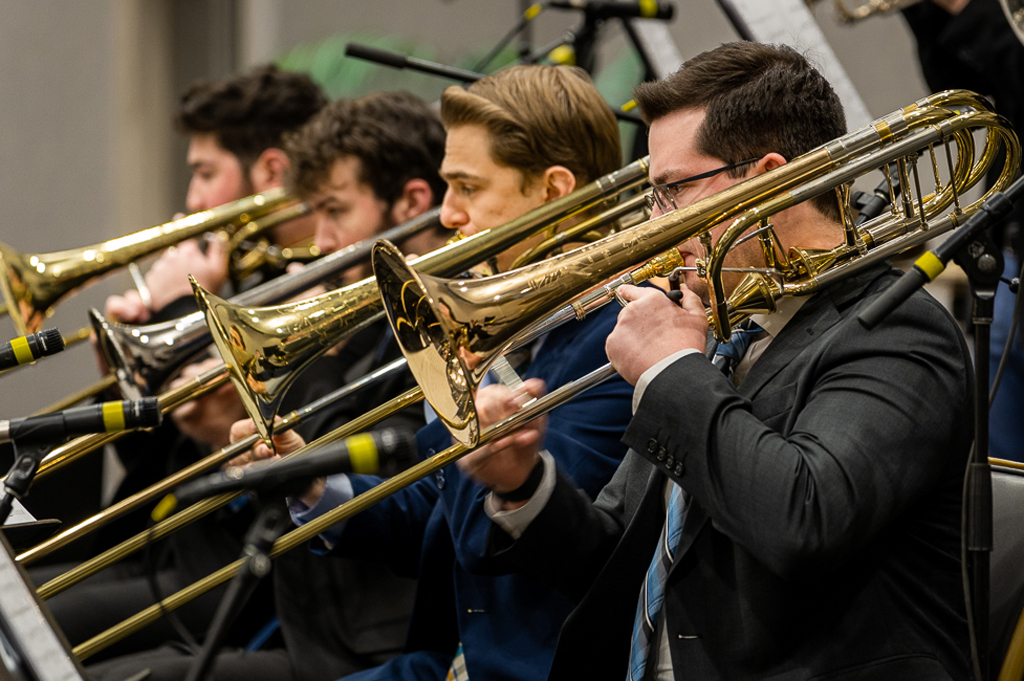 Trombonists performing.