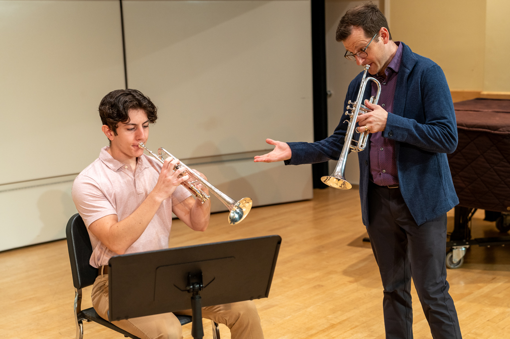 A private trumpet instructor teaches a lesson.