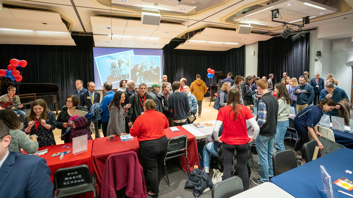 A crowd at a music admissions event.