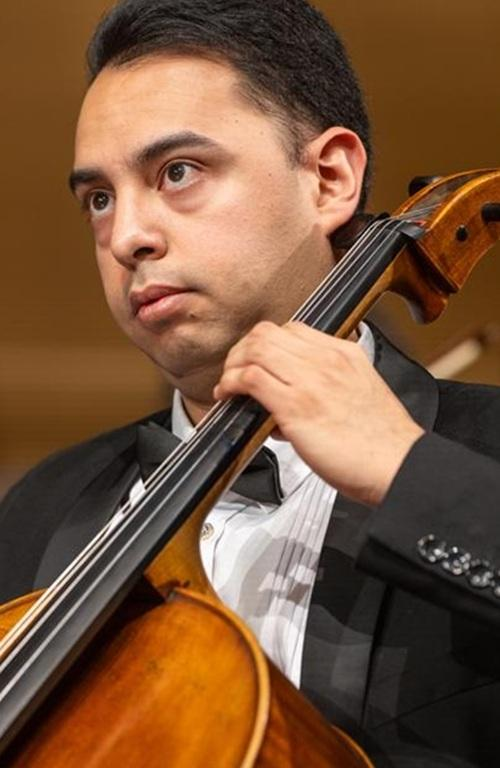 William Garcia playing the cello.
