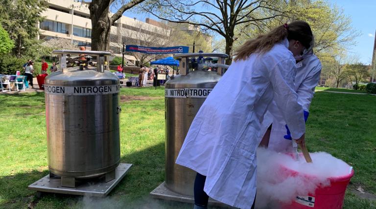 two people making liquid nitrogen ice cream