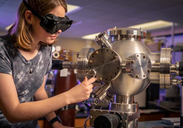 a girl using a machine