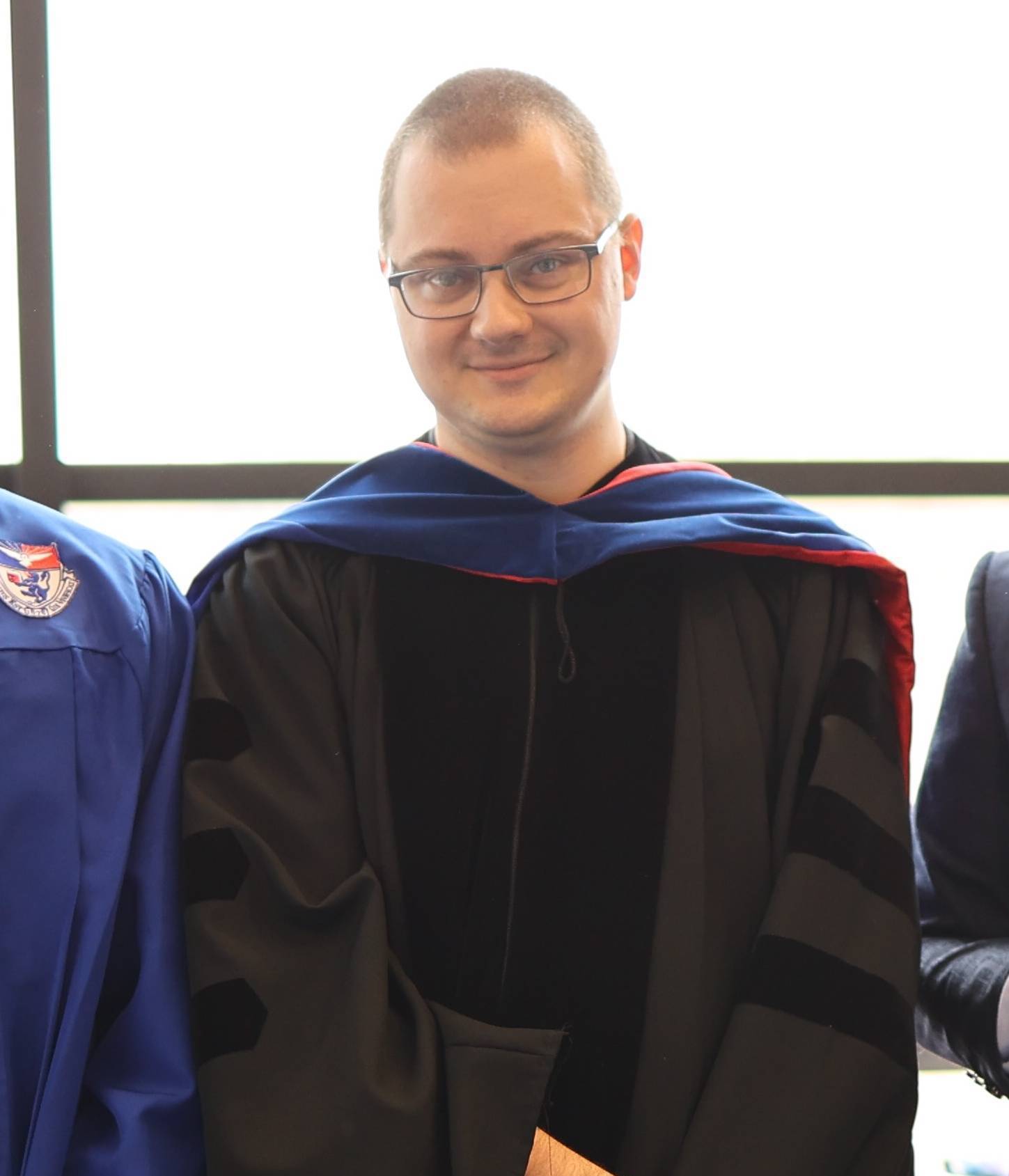 male in a graduation gown