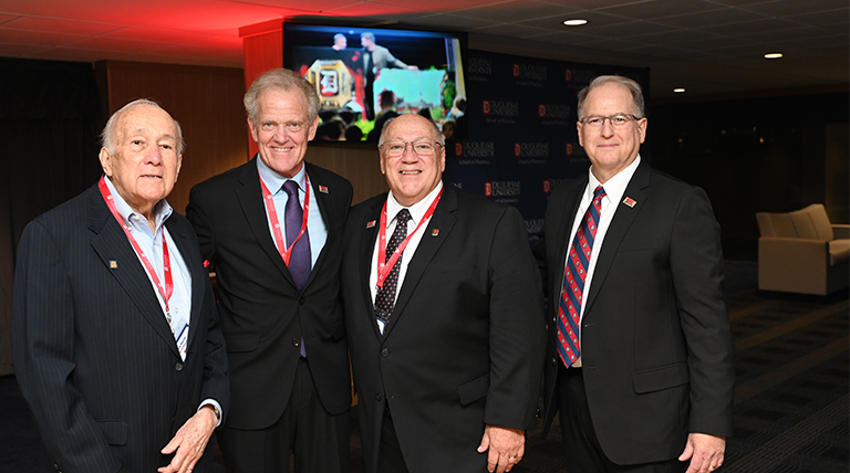 deans standing together