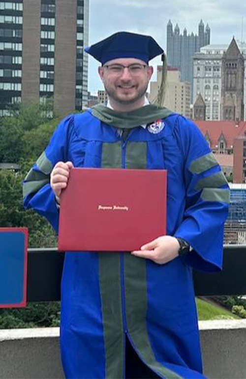 matt jones with his diploma