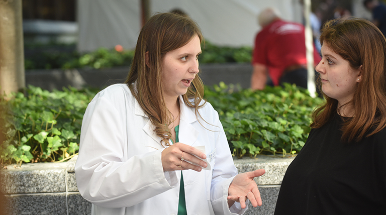 a counseling session with a student pharmacist and patient