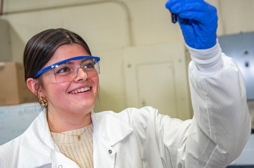 student and professor engaging in research