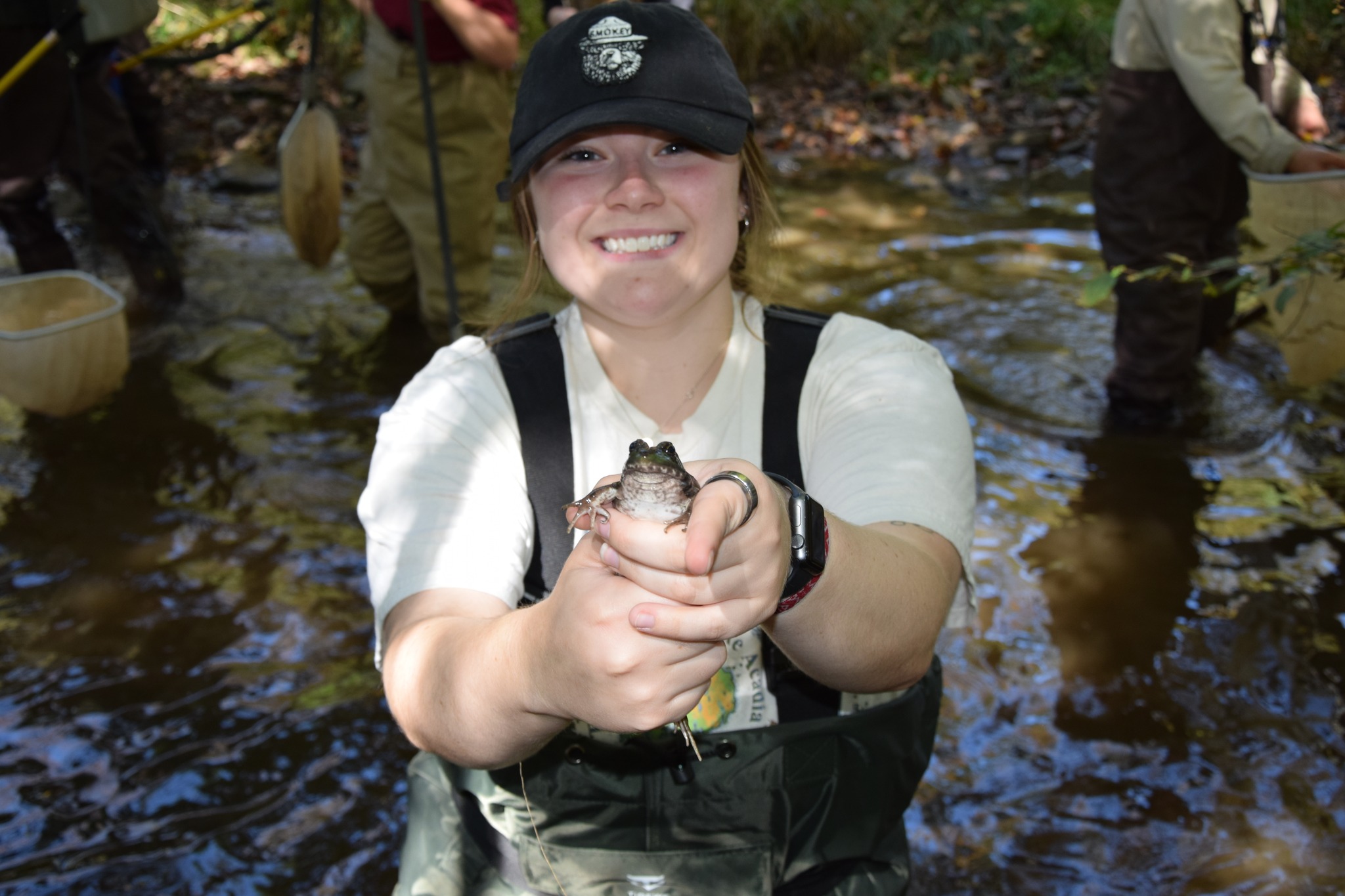 people holding up a sign