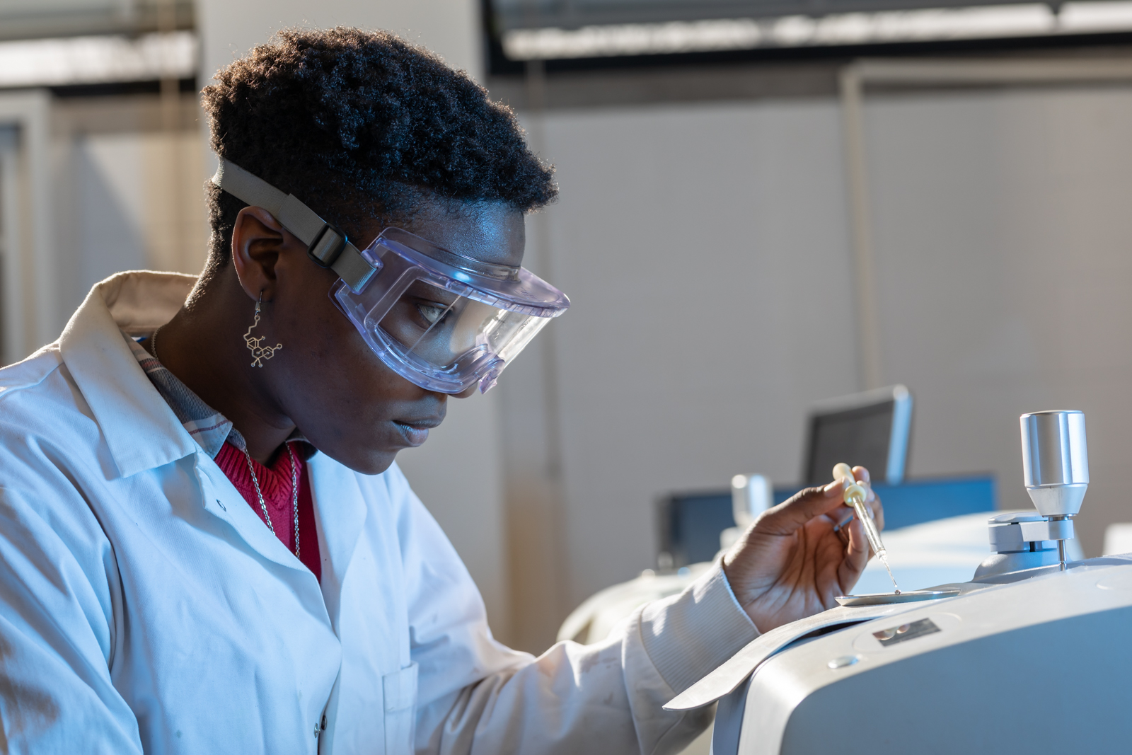 A picture of a girl doing research in a lab