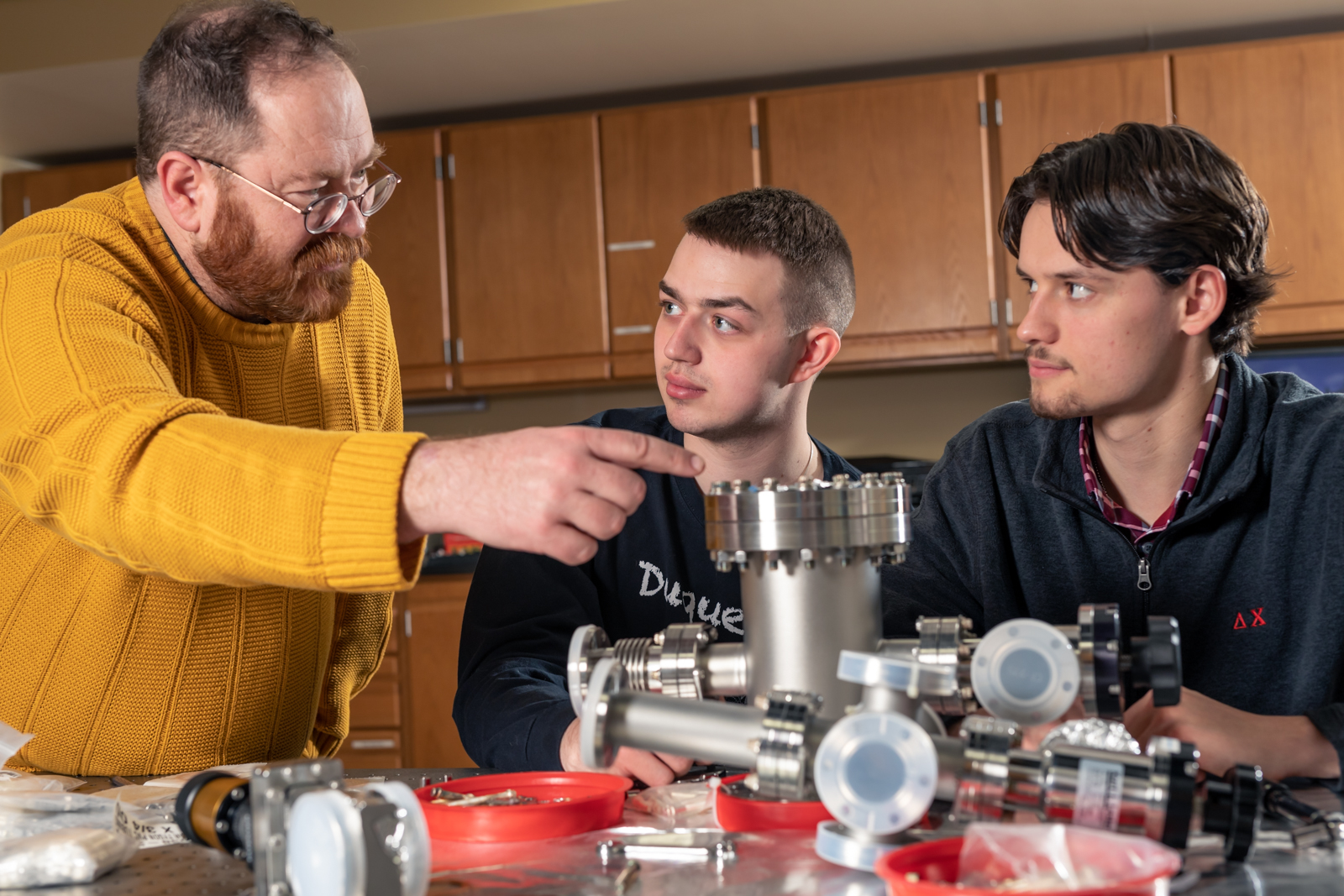 a picture of a Male and students