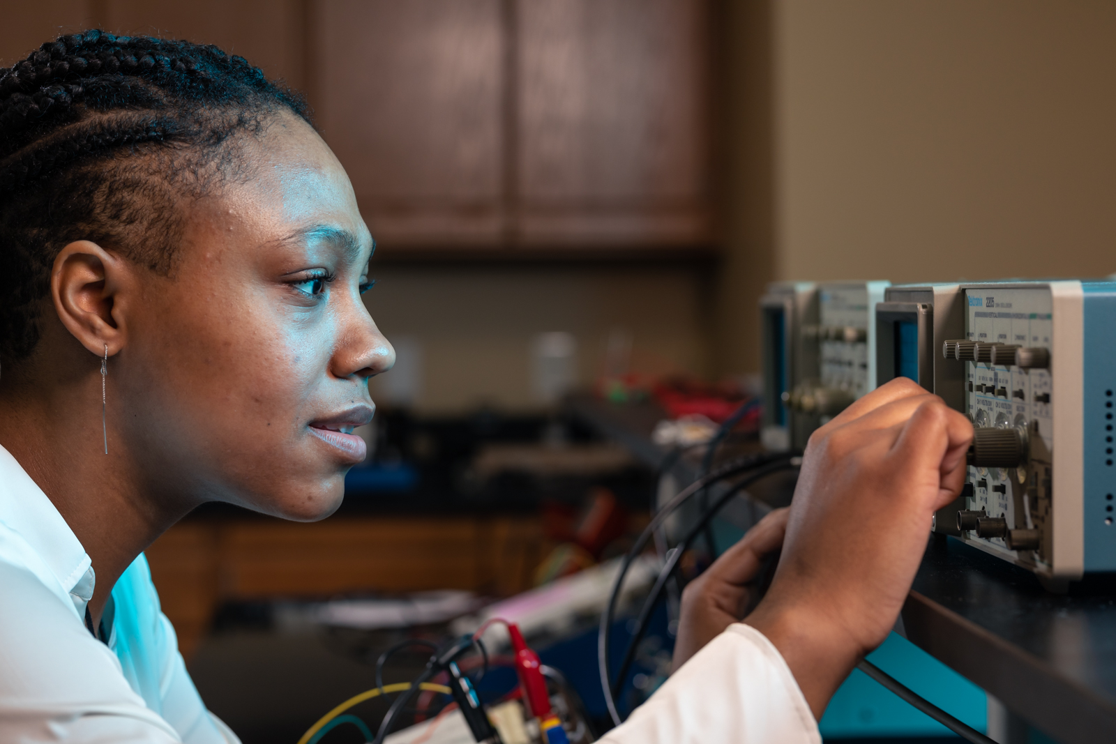 a girl with a machine