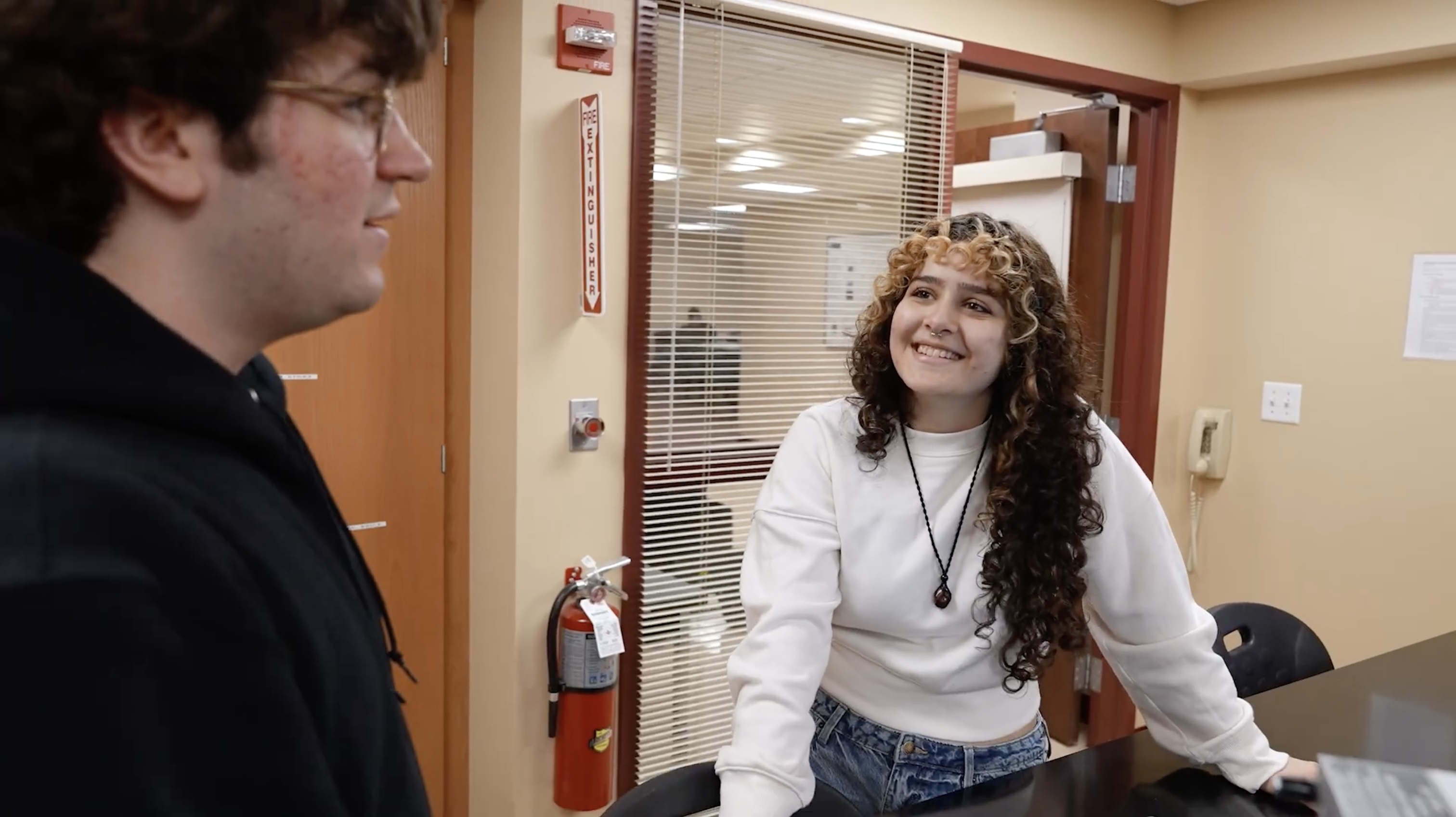 a boy writing on a board
