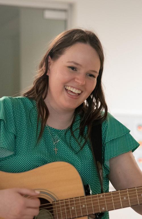 Music therapy major Rachel Anderson with guitar