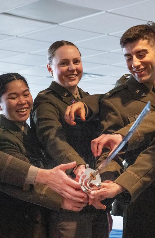 Pictured center is Elizabeth Osterhaus with her fellow ROTC cadets