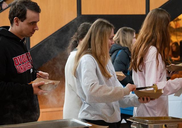 Students enjoying free food on campus. 