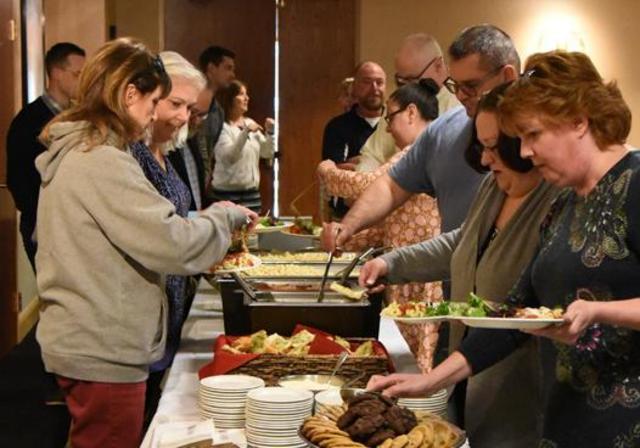 Spiritan Friends lunch, people feasting at a buffet