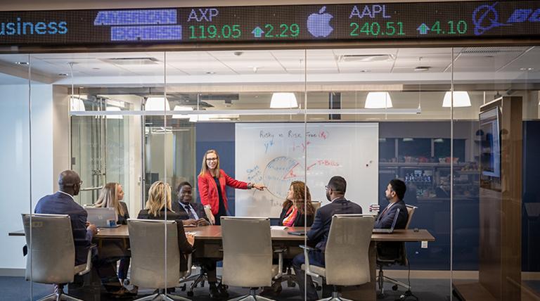 Students meeting in Business School conference room.