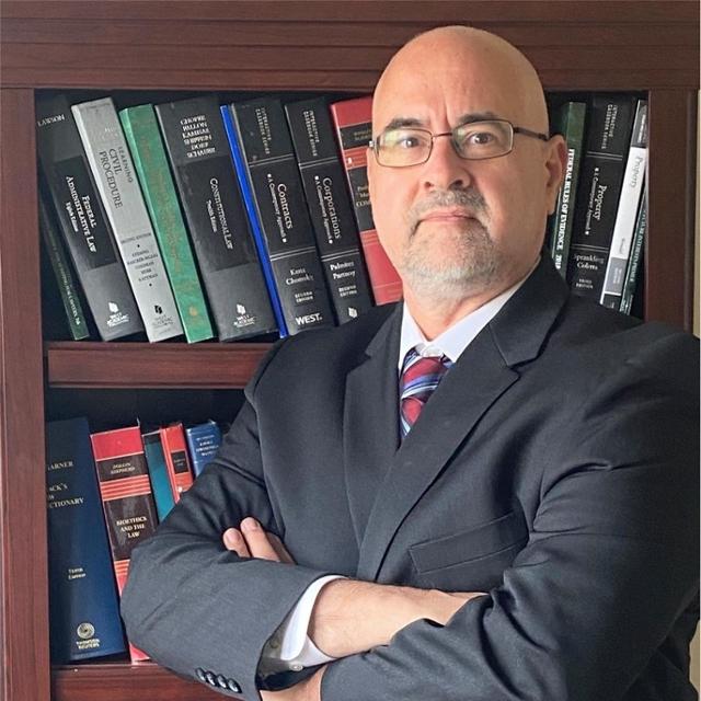 John A. Daller, MD, PhD, JD, FCLM