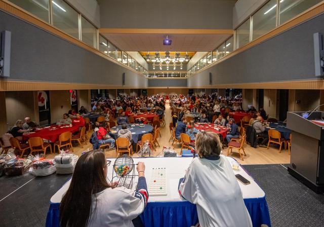 Students are playing bingo during an event on campus.