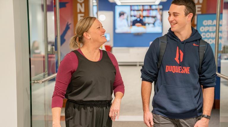 Duquesne staff member and undergraduate student at the One Stop center on campus