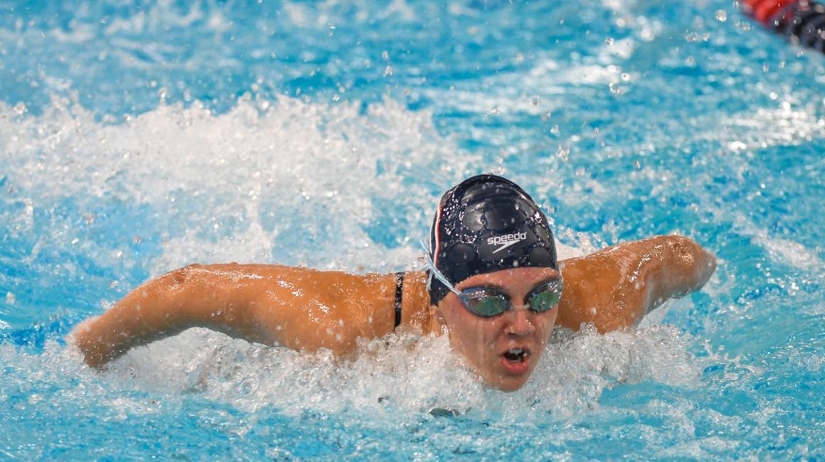 Duquesne swimmer Haley Scholer swims in a meet