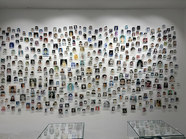 "Once Upon a Time and Never Again" exhibit displays the photographs of children who passed during the conflict