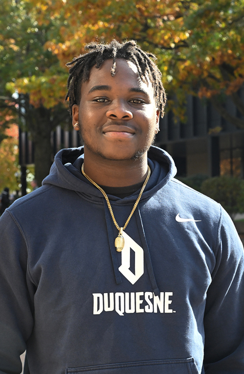 Headshot of School of Education student Mwango Kasuba