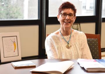 Becky Kronk at her desk